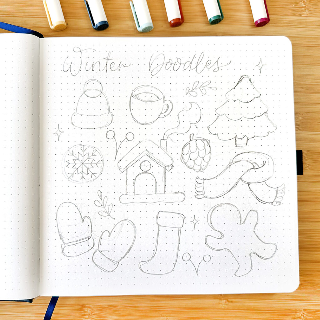 Imagen de doodles de invierno a lápiz en cuaderno cuadrado